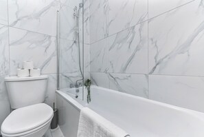 Hair dryer, towels, soap, toilet paper