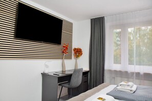 1 habitación, tabla de planchar con plancha, wifi gratis y ropa de cama 