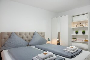 1 habitación, tabla de planchar con plancha, wifi gratis y ropa de cama 