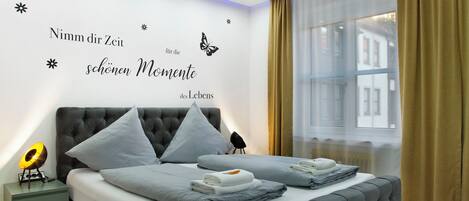 1 dormitorio, tabla de planchar con plancha, wifi gratis y ropa de cama