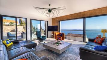 Villa Deluxe, vista al mar | Área de sala de estar