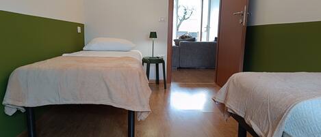 2 bedrooms, travel crib, WiFi, bed sheets