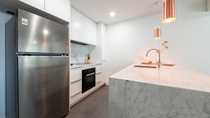 Fridge, stovetop, coffee/tea maker, toaster