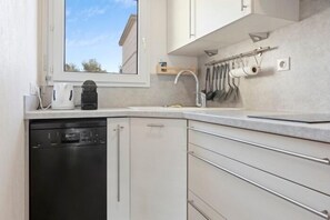 Fridge, microwave, dishwasher, coffee/tea maker