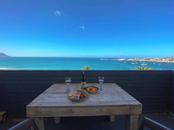 Outdoor dining - Simon’s Town Seaside Apt | Views, Balcony, Parking (Cape Town)