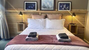 2 habitaciones, tabla de planchar con plancha, cuna de viaje y wifi