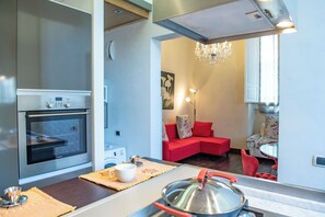 Apartment | Living area | 24-inch flat-screen TV with digital channels