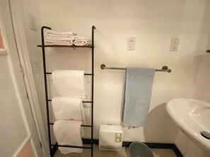 Hair dryer, towels, soap, shampoo