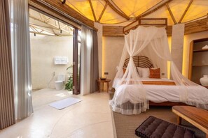 Suite, 1 King Bed, Pool View | Minibar, in-room safe, desk, laptop workspace