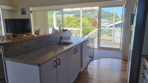 Fridge, microwave, oven, stovetop - Spacious 4BR House Near Marina & Town, Secure Yard (Whangamata)