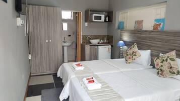 Quarto, 2 quartos, acessível, para fumantes | Comodidades do quarto