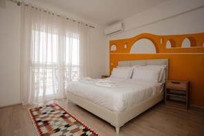 2 عدّة غرف نوم ومكواة/لوح كي وواي فاي وملاءات أسرّة