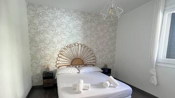 2 dormitorios, tabla de planchar con plancha, wifi y ropa de cama