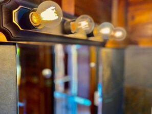 A close-up of a light fixture with multiple bulbs.