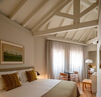 Double Room, City View | Minibar, in-room safe, laptop workspace, blackout drapes