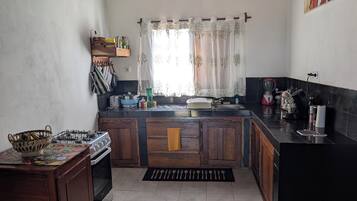 Fridge, stovetop, coffee/tea maker, electric kettle