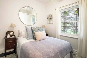 2 bedrooms, desk, iron/ironing board, travel crib