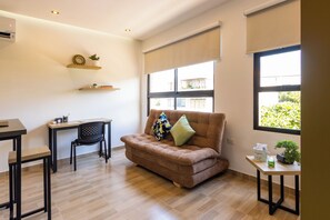 Standard Apartment, City View | Living area | Flat-screen TV - Caobos Center Coliving & Coworking (San José de Cúcuta)