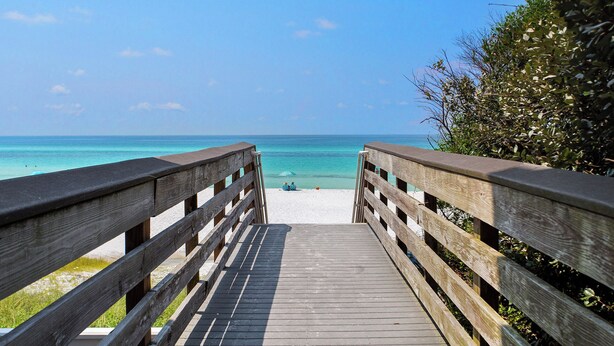 A wooden boardwalk leading to a beach with clear turquoise water and a clear sky. - Just Shellin' - Santa Rosa Beach, Walk to Shops + Dining, Walk to Beach! (Santa Rosa Beach)