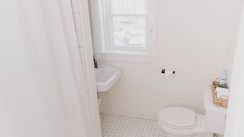 Shower, hair dryer, soap, shampoo
