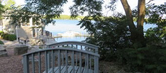 Lakefront Getaway just steps to the water, with games, docks, kayaks, and more! 