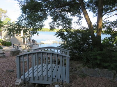 Lakefront Getaway just steps to the water, with games, docks, kayaks, and more! 