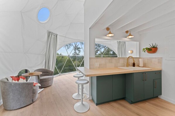 Fridge, coffee/tea maker, cookware/dishes/utensils