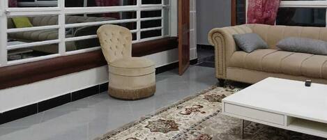 Maison mitoyenne Familiale, vue jardin | Coin séjour