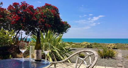 Walk on Waterfront & big views define this newly renovated Beach House. Pets OK