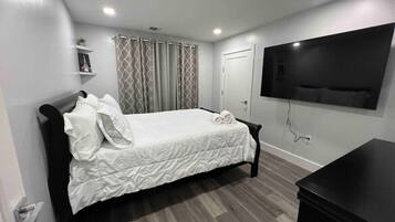 2 habitaciones, tabla de planchar con plancha, cuna de viaje y wifi
