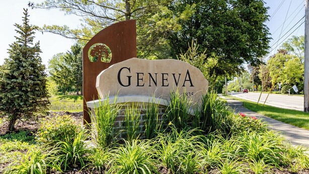 A sign with the word "GENEVA" surrounded by greenery and trees. - Charming 2-bedroom house with WiFi, AC in brilliant Geneva (Geneva)