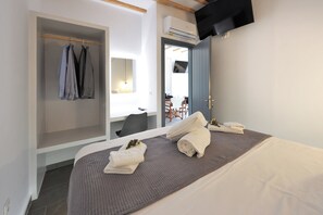 2 habitaciones, tabla de planchar con plancha y cuna de viaje 