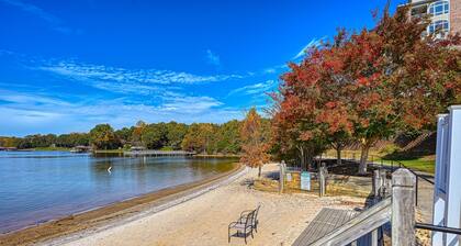 Spacious condo with on-site pools, sandy beach, sports courts, & golf