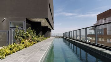 Outdoor pool, pool umbrellas, sun loungers