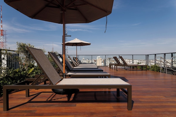 Outdoor pool, pool umbrellas, pool loungers