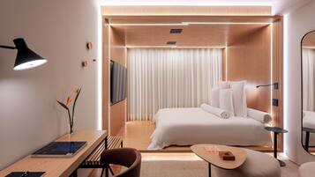 Kamar Double Deluks | Seprai premium, minibar gratis, brankas, dan tirai kedap cahaya