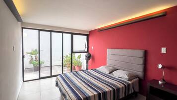 Desk, laptop workspace, blackout drapes, WiFi