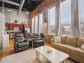 Living area - Spacious 1 Bedroom Condo with Indoor Pool, Theatre, Gym, and Close to Beach! (South Haven)