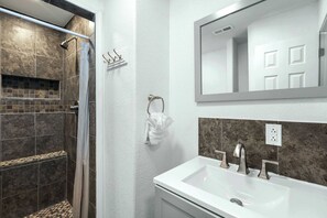 Shower, hair dryer, shampoo