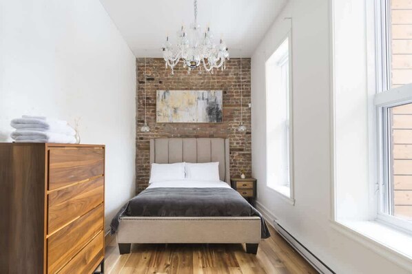 Iron/ironing board, travel crib, free WiFi, bed sheets