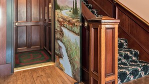 An elevator with a wooden finish and a door with a decorative panel. - Luxary Castle & SPA near Skiing Resort (Wrightwood)