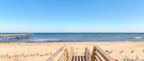 On the beach, sun-loungers