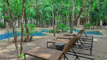 Appartement Deluxe, véranda | Coin séjour | Télévision à écran plat