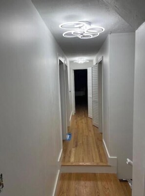 Stroll down this elegant hallway to discover what lies beyond.