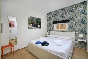 1 chambre, fer et planche à repasser, Wi-Fi, literie fournie