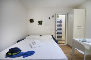 1 bedroom, iron/ironing board, WiFi, bed sheets - GuestHost - Comfortable apartment that accommodates up to 4 people, located in a well-served semi-central neighborhood, less than 15 minutes by bus from the historic center. The location is ideal for students or academic staff, thanks to its proximity to (Bari)