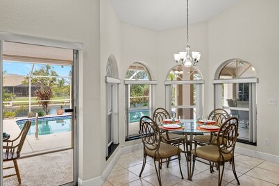 Villa Dolly - Electric-heated pool home w/foosball table! - SWFL Rentals