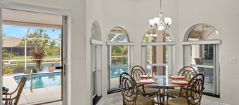 NEW LISTING! Electric-Heated Pool Home on Canal - Villa Dolly