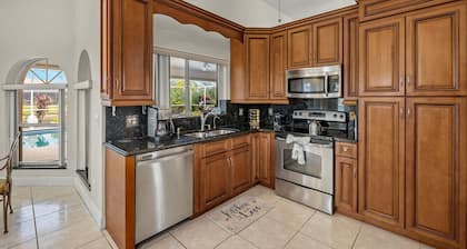 NEW LISTING! Electric-Heated Pool Home on Canal - Villa Dolly