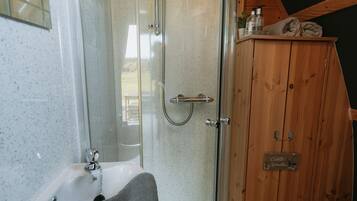 Shower, towels, soap, shampoo